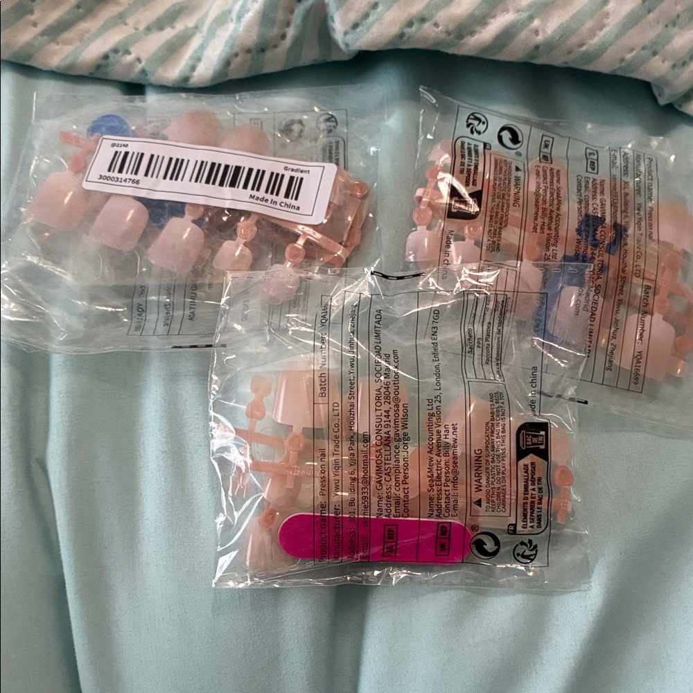 3 packages of press on French nails for toes with nail tapes
